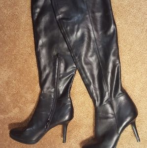 Black leather over the knee heeled boots